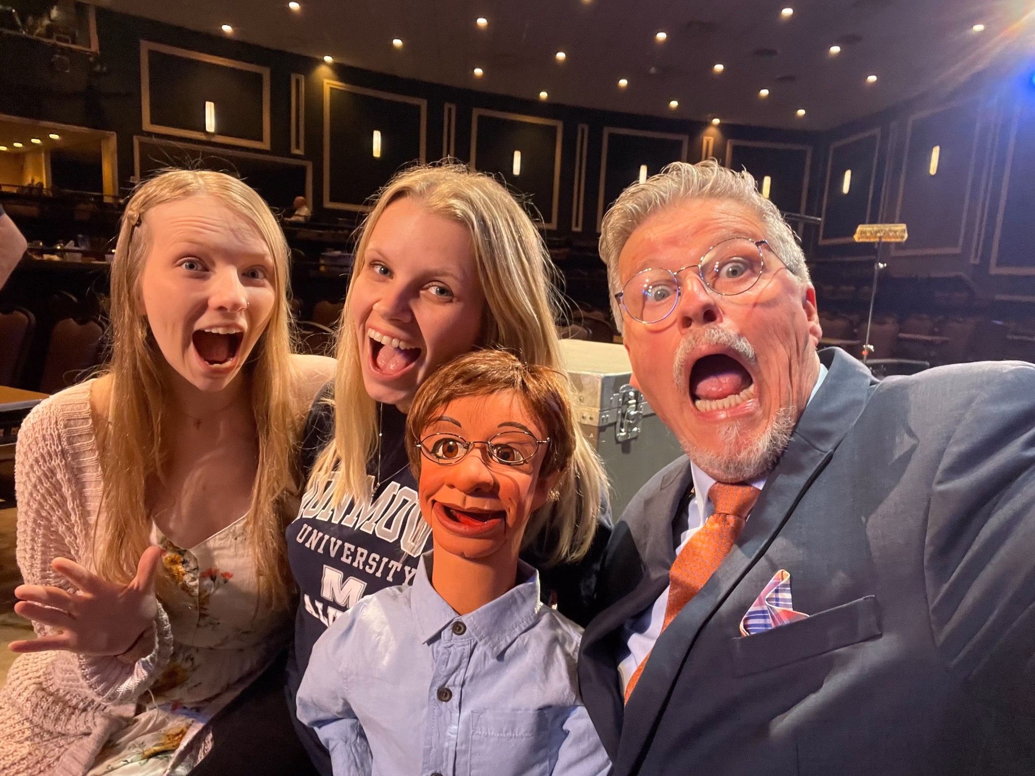 Al Getler, Paul Donnelly and two audience members share a surprised reaction.