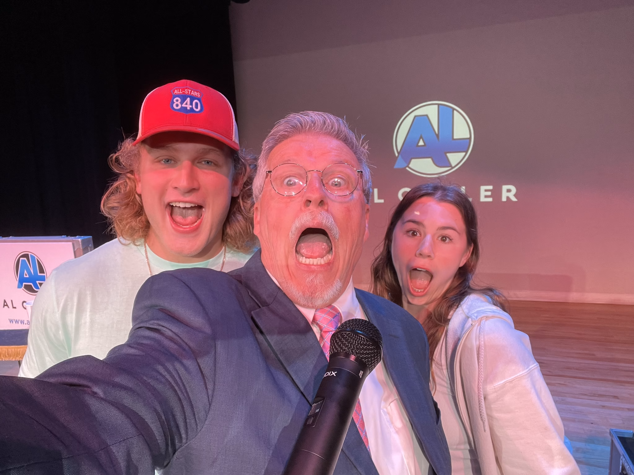 Al Getler with two members of the PuppetMouth Singers onstage.
