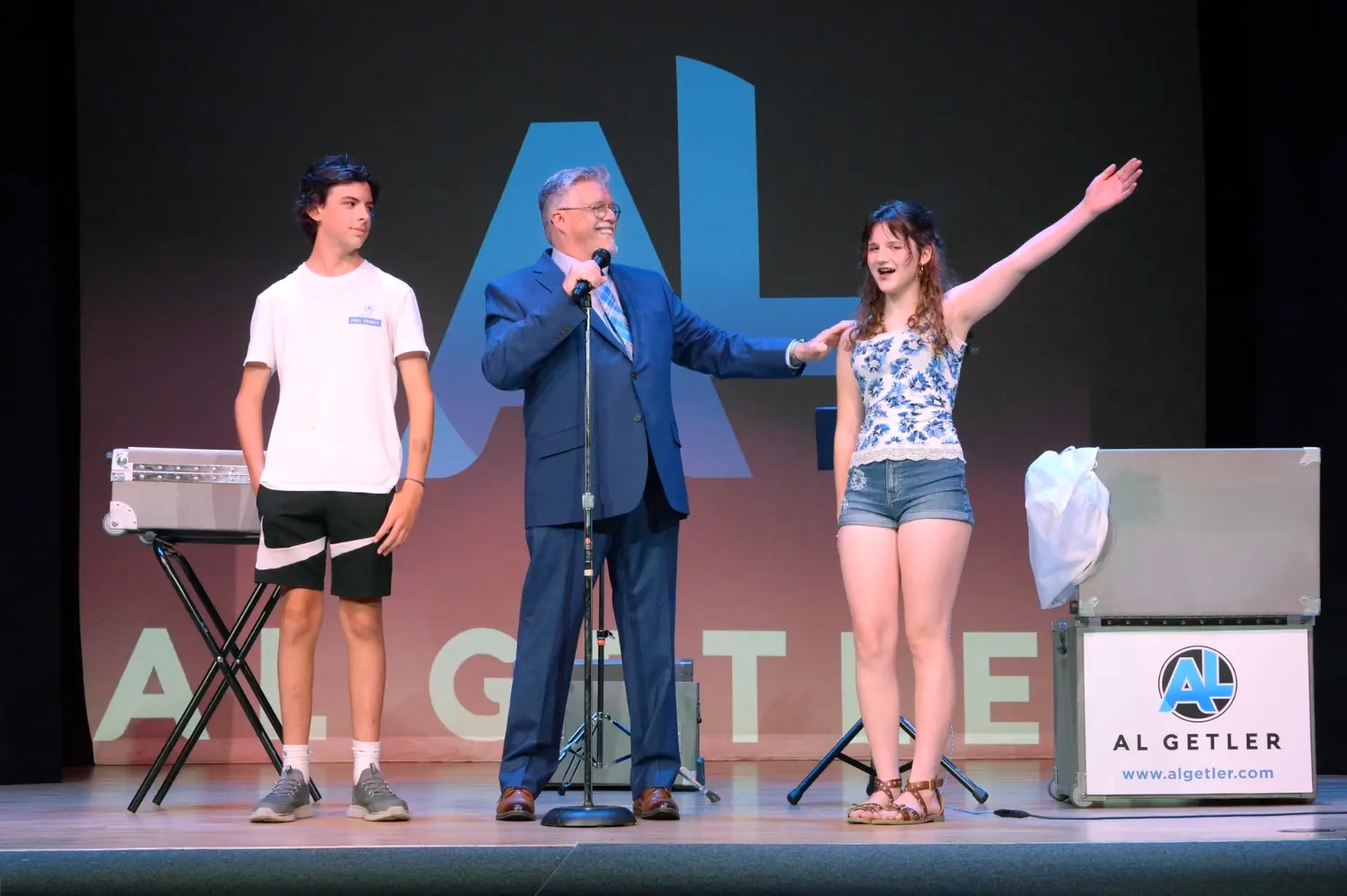Al Getler creating a live comedy moment with audience volunteers